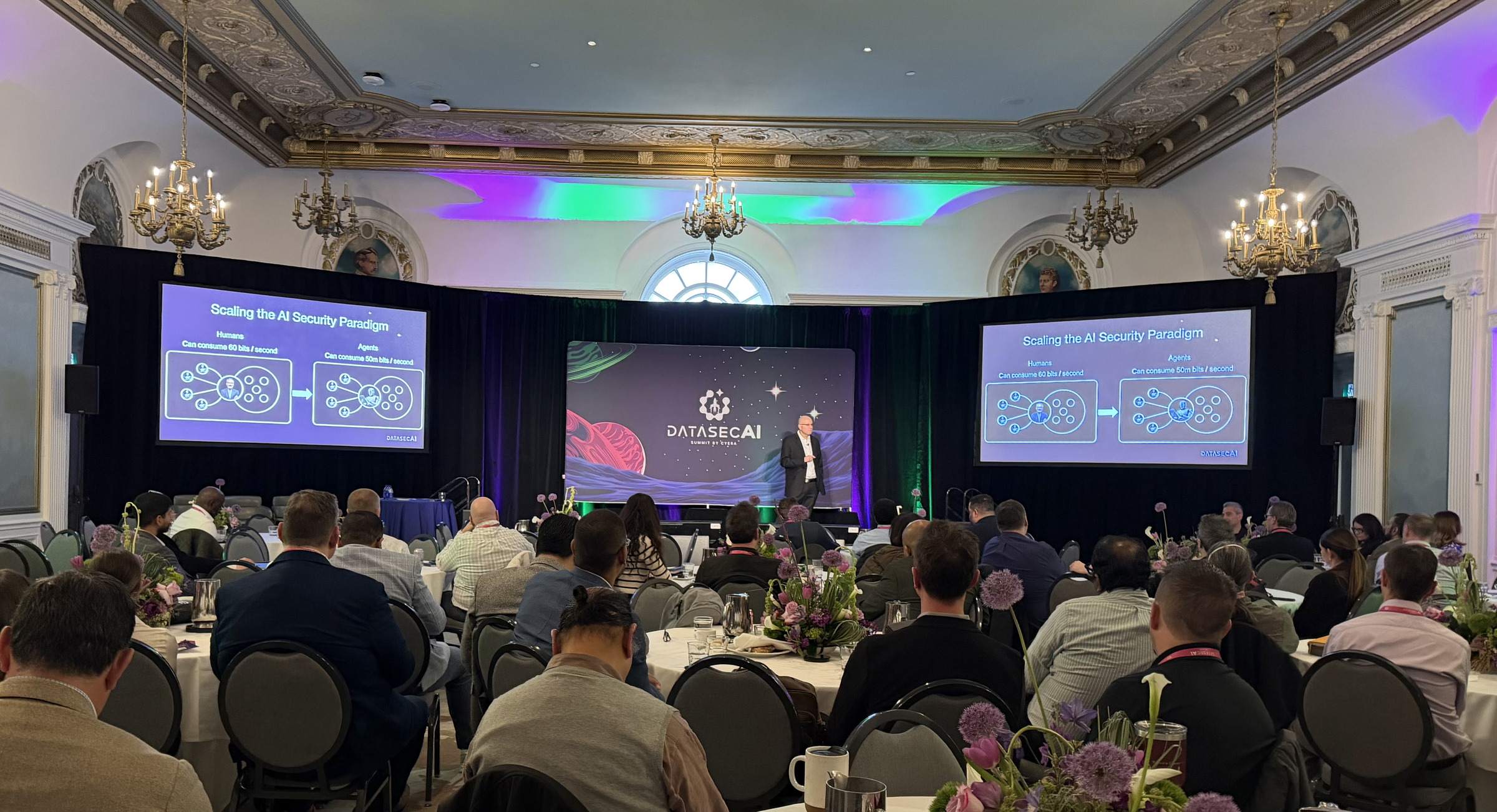 Thomas Mazzaferro presenting a session on scaling the AI security paradigm to a seated executive audience at the DataSecAI Summit.